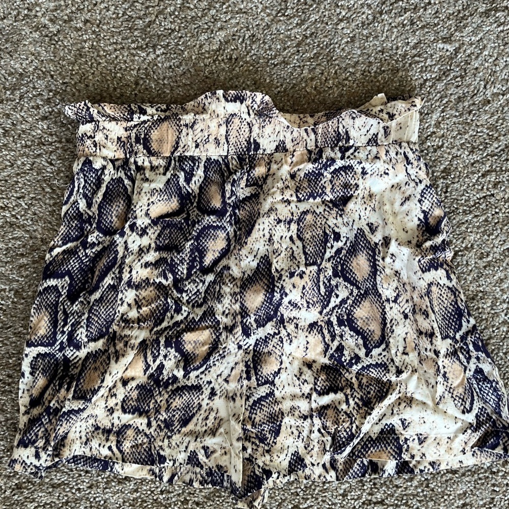 Women’s elastic waist shorts that have a tie in the front.